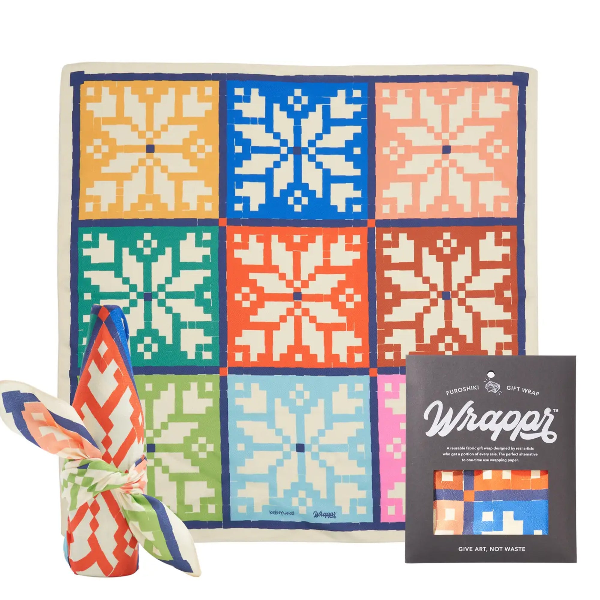 Colorful patterned gift wrap with a decorative bow and packaging on a white background