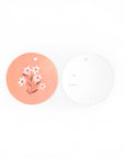 Two gift tags, one peach with floral design and one white with 'To' and 'From' text, on a white background.