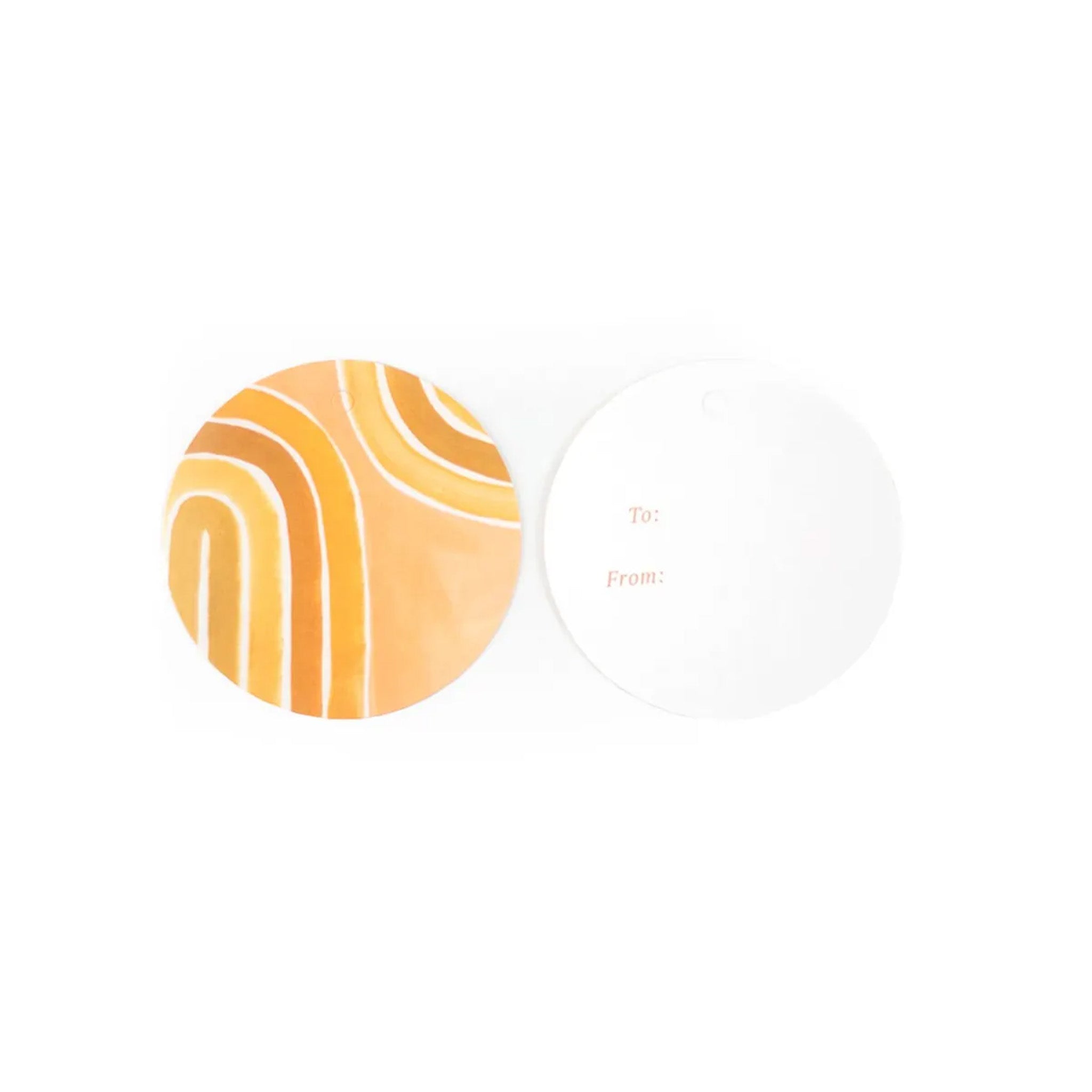Round gift tag with orange and yellow abstract design on a white background