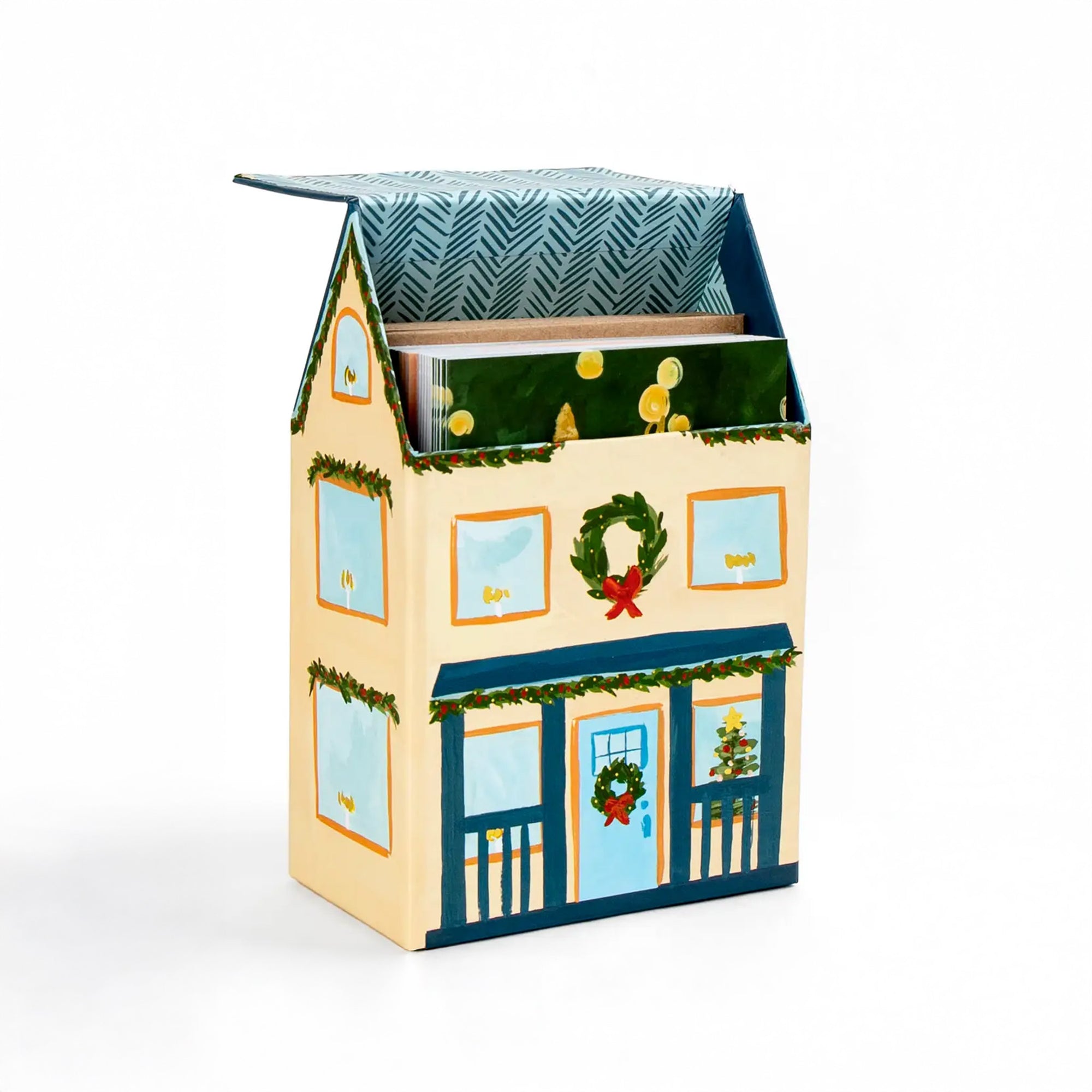 House-shaped gift box with Christmas design on a white background