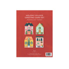 Holiday Village greeting card set packaging with colorful houses on a red background