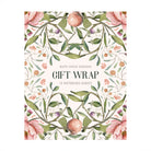 Gift wrap book with floral design and text by Ruth Chou Simons on a white background