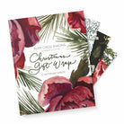 Christmas gift wrap with floral design and Ruth Chou Simons branding