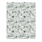 Patterned paper with green leaves and birds on a white background