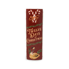 Spine of vase that says  'Twelve Days of Christmas' in gold lettering, decorated with white candy canes, green wreath motifs, and a small turkey illustration near the bottom, shown on a plain white background.