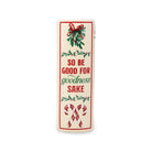 spine of ceramic vase with a festive Christmas design. The front features the text 'SO BE GOOD FOR goodness SAKE' in red and green lettering, decorated with illustrations of mistletoe and candy canes at the top and bottom.