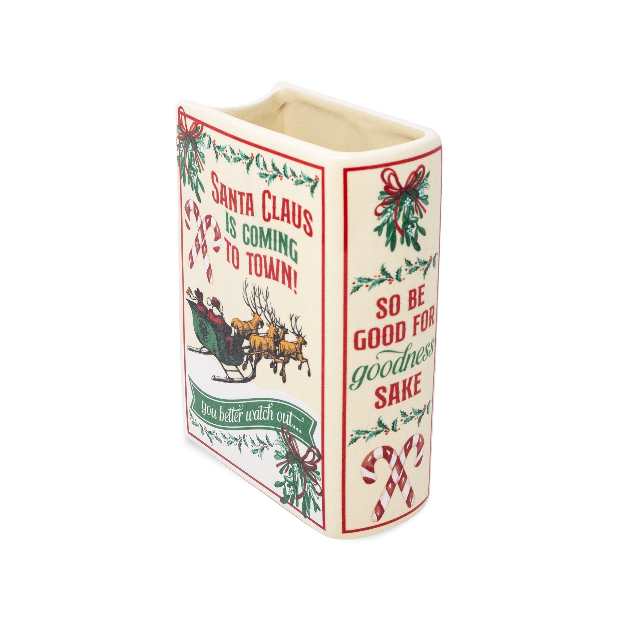 A rectangular ceramic Christmas vase with a Santa Claus sleigh illustration and holiday text on an off-white background, isolated on a white studio background.