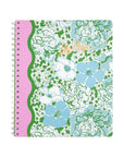 Floral notebook with pink spine on a white background