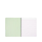 Notebook with green striped and plain white pages on a white background