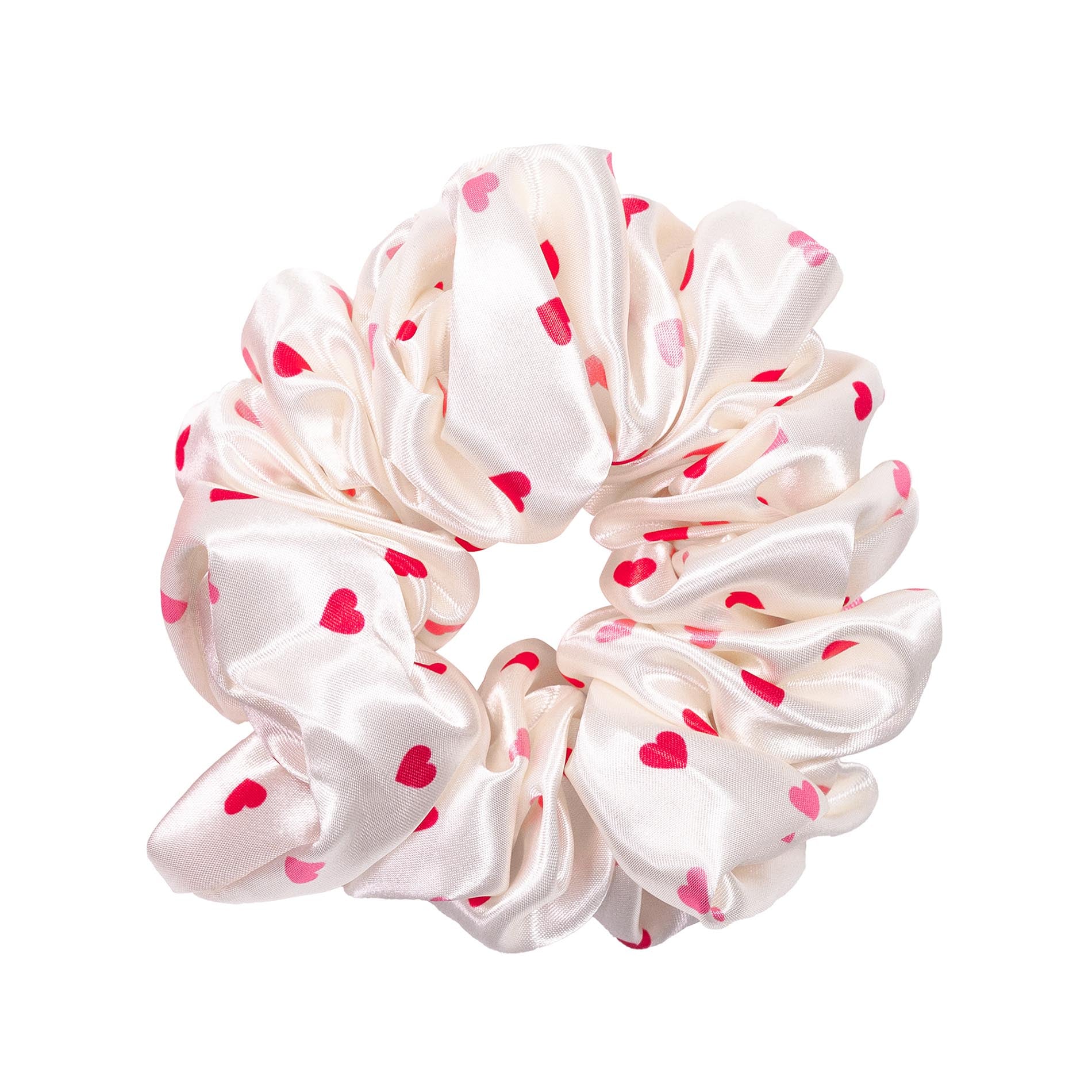 White scrunchie with red heart patterns on a white background