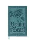 Teal notebook with rose design and 'Beauty and the Beast' text on a white background