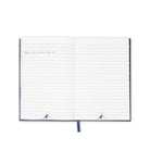 Open notebook with lined pages on a white background