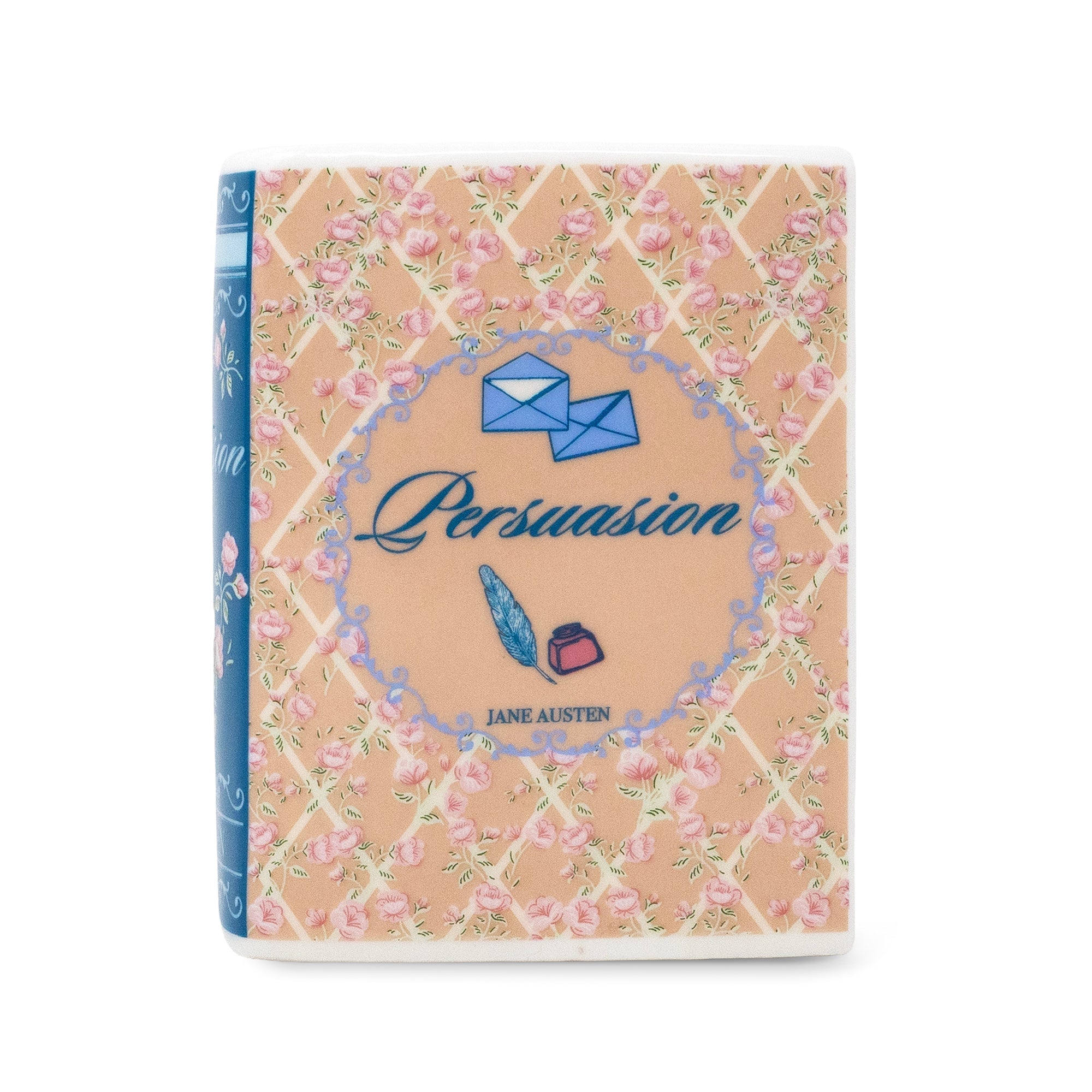 The book cover of Jane Austen's 'Persuasion' is shown against a plain white background. The cover features a peach-beige background with a pink floral lattice pattern, blue envelopes, and blue script text for the title.