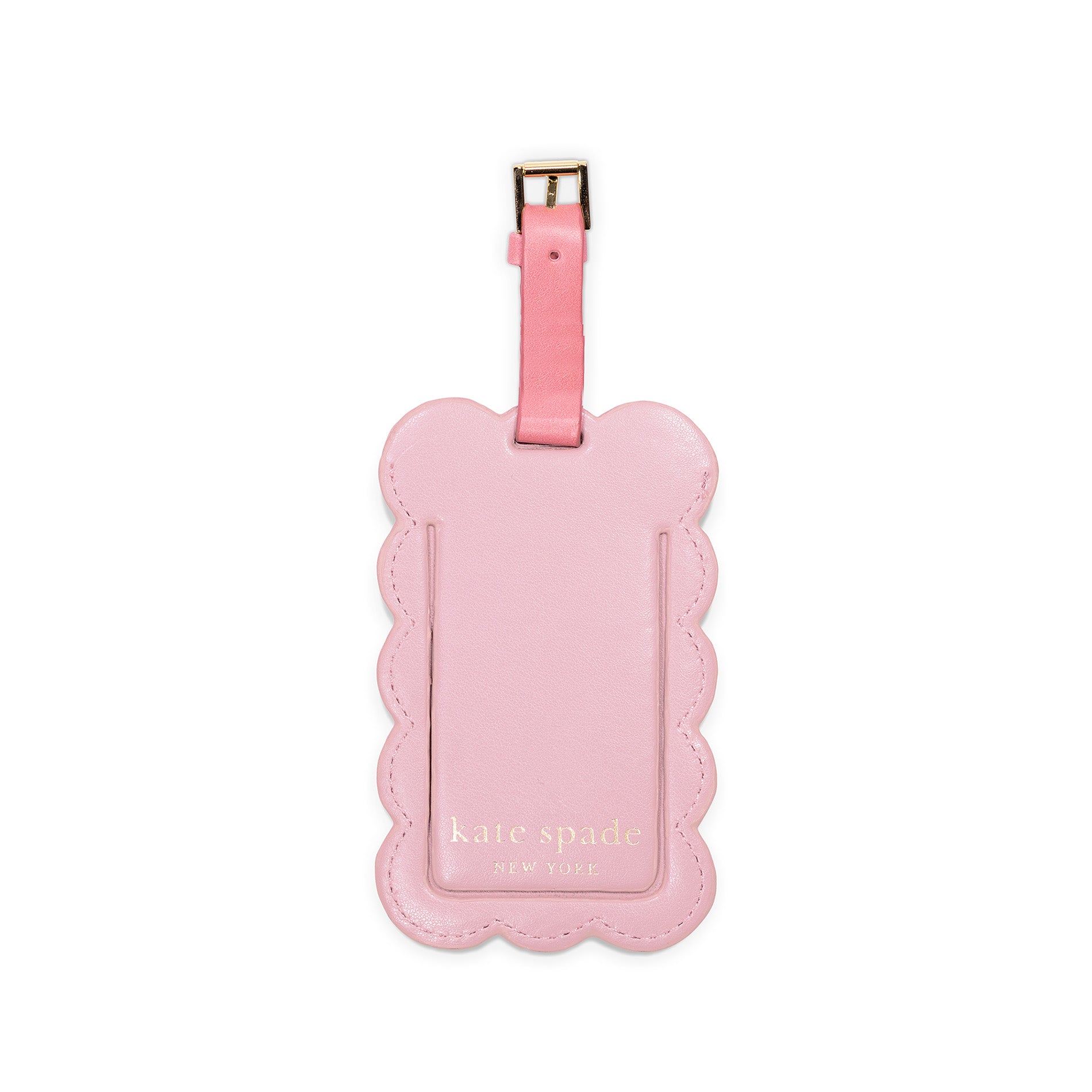 Pink luggage tag with scalloped edge and &#39;kate spade&#39; branding on a white background