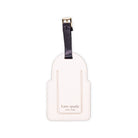 White luggage tag with black strap and 'kate spade new york' branding on a white background