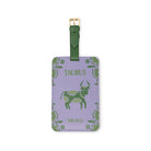 periwinkle luggage tag with green trim that says 'TAURUS' 'THE BULL' with bull image