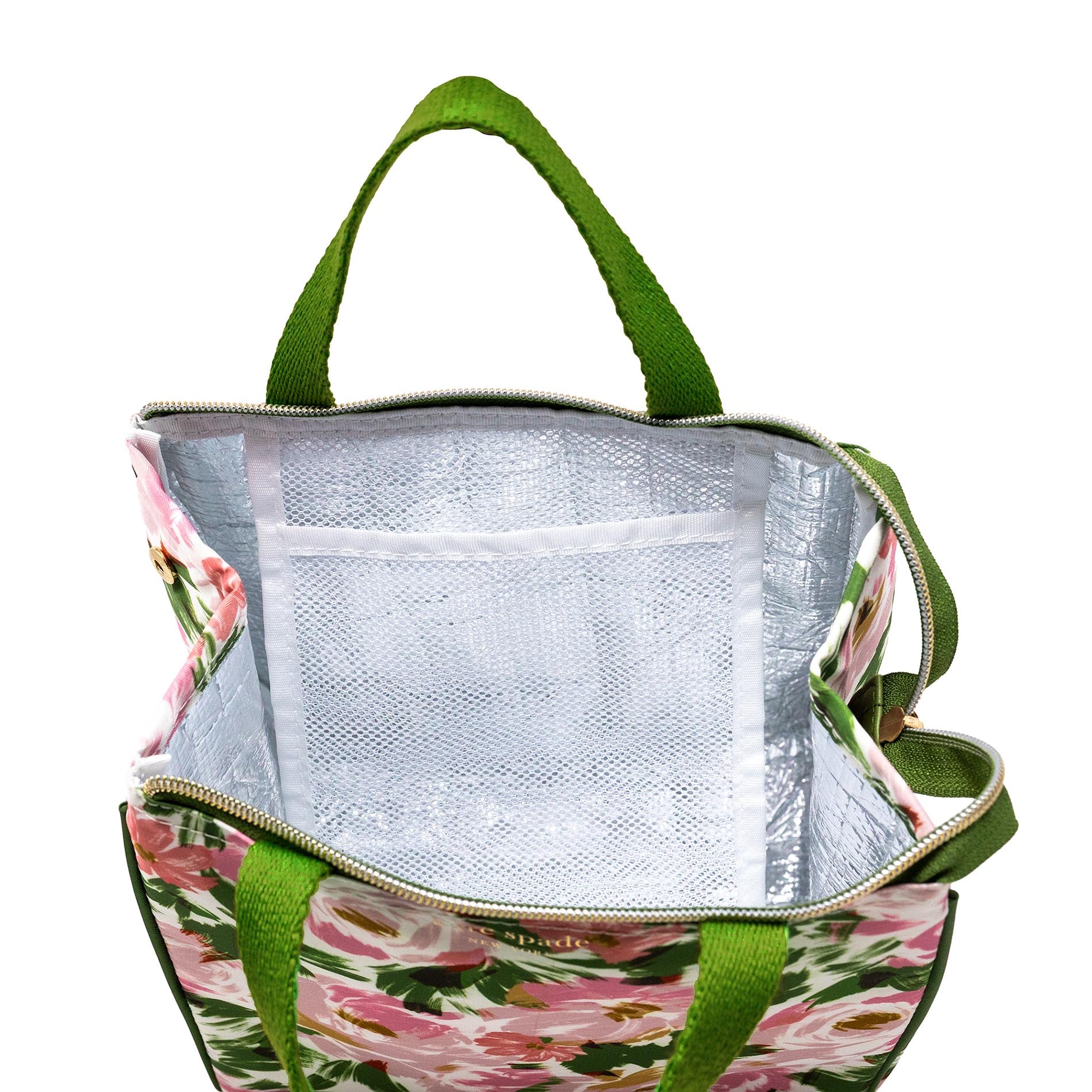 Floral-patterned cooler bag with green handles on a white background