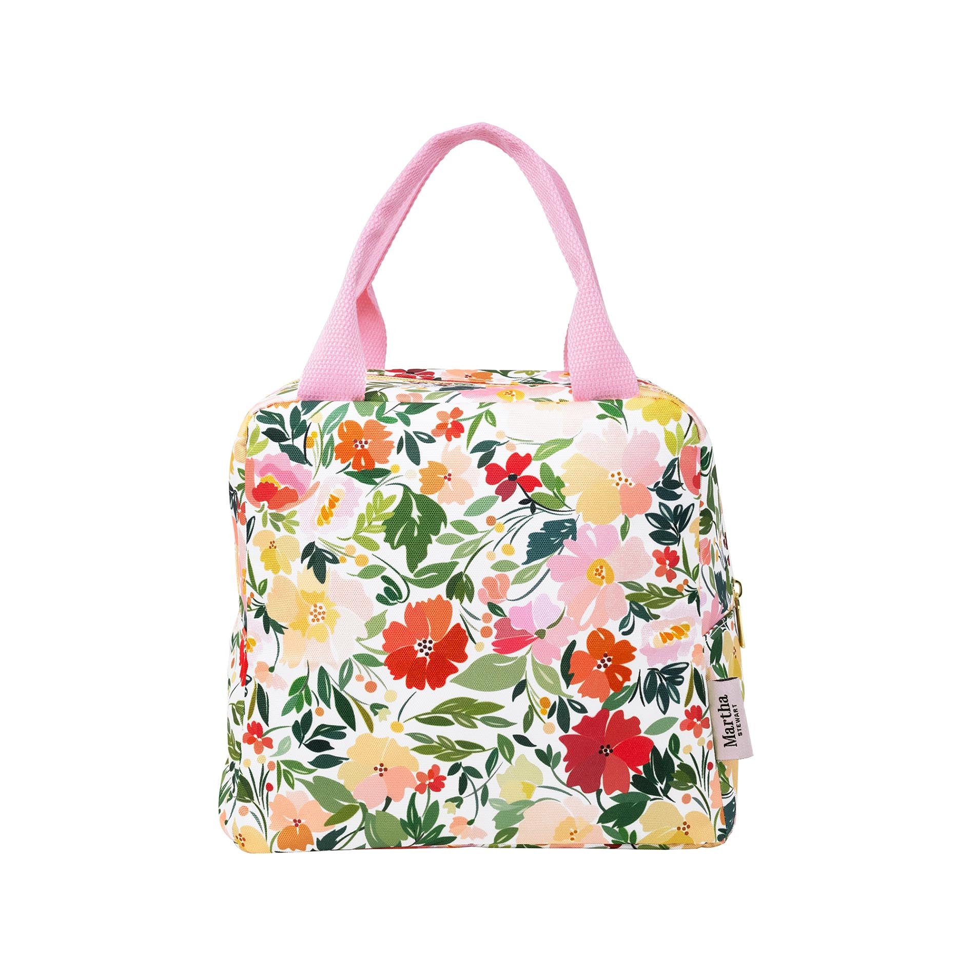 Floral-patterned bag with pink handles on a white background