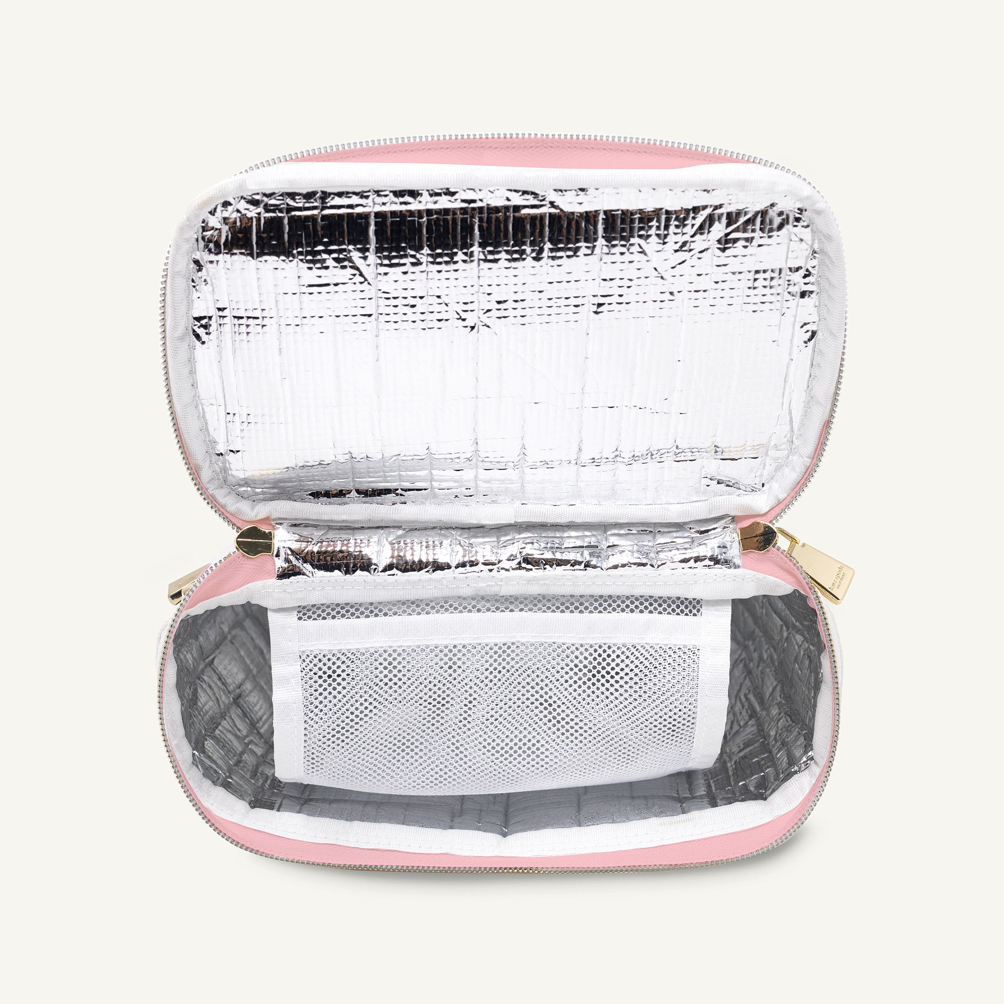 Insulated cooler bag with pink exterior and silver interior on a white background