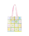 Tote bag with colorful floral pattern on a white background