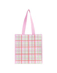 Tote bag with pink and green plaid pattern on a white background