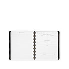 Spiral-bound notebook with black binding on a white background