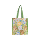 mesh market bag with green trim and retro floral and sun print