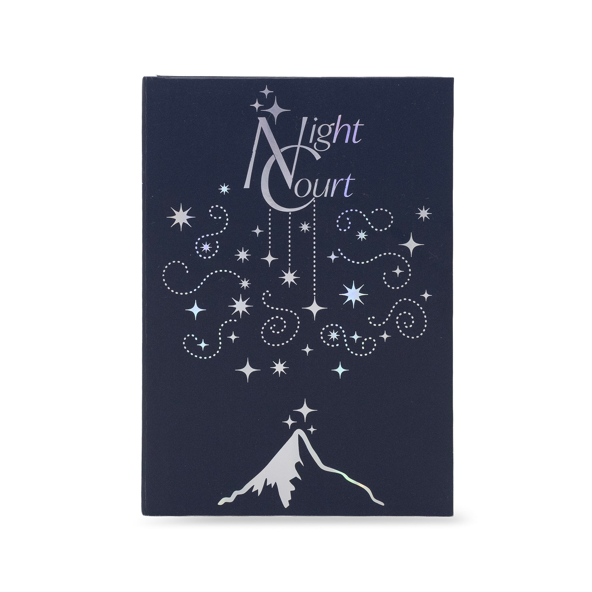 A dark navy blue book packaging with a silver and white celestial design featuring stars, swirls, a mountain peak, and the words 'Night Court' on the front, set against a plain white background.