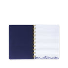 Open notebook with blue cover and white lined pages on a white background