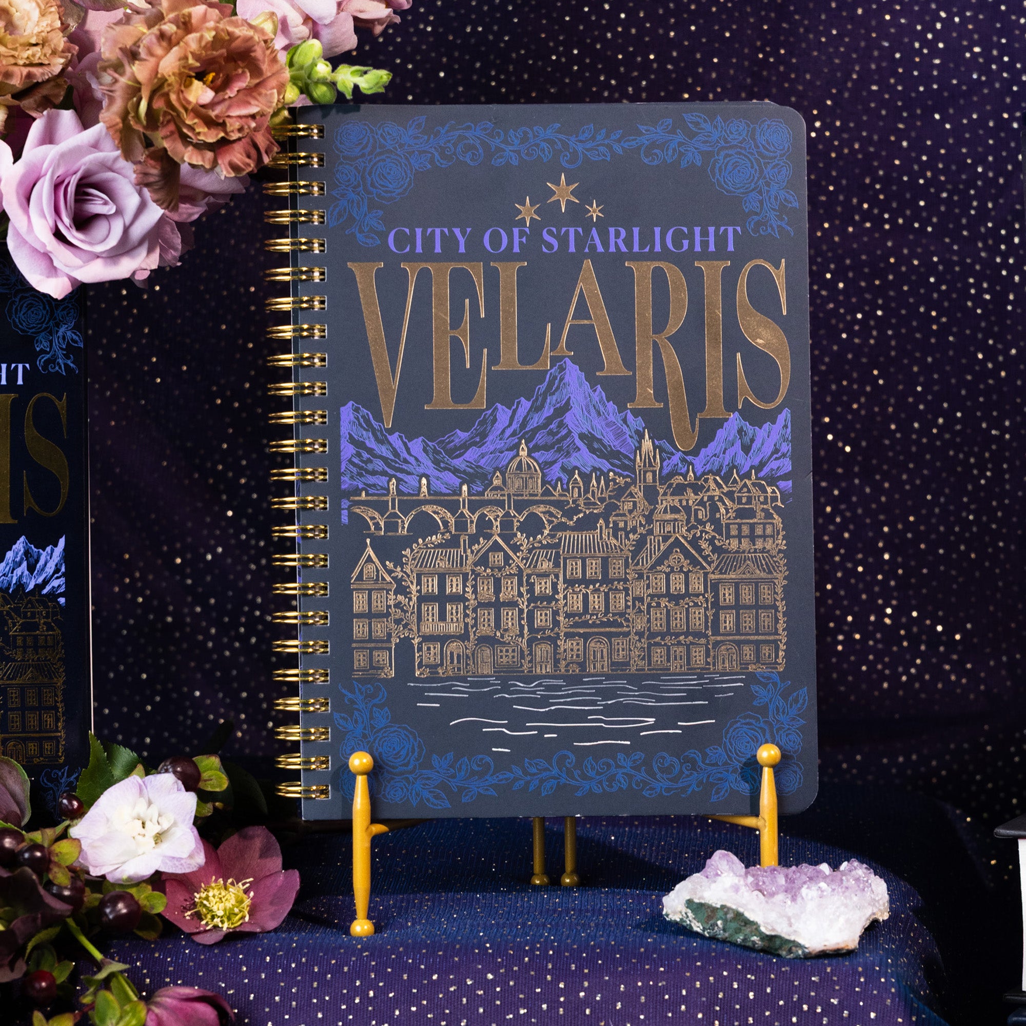 Notebook with 'City of Starlight Velaris' design on a sparkly background