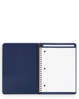 Open blue notebook with lined pages on a white background
