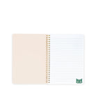 Open notebook with beige cover and white lined pages on a white background