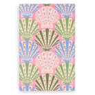 Patterned fabric with colorful fan designs on a pink background