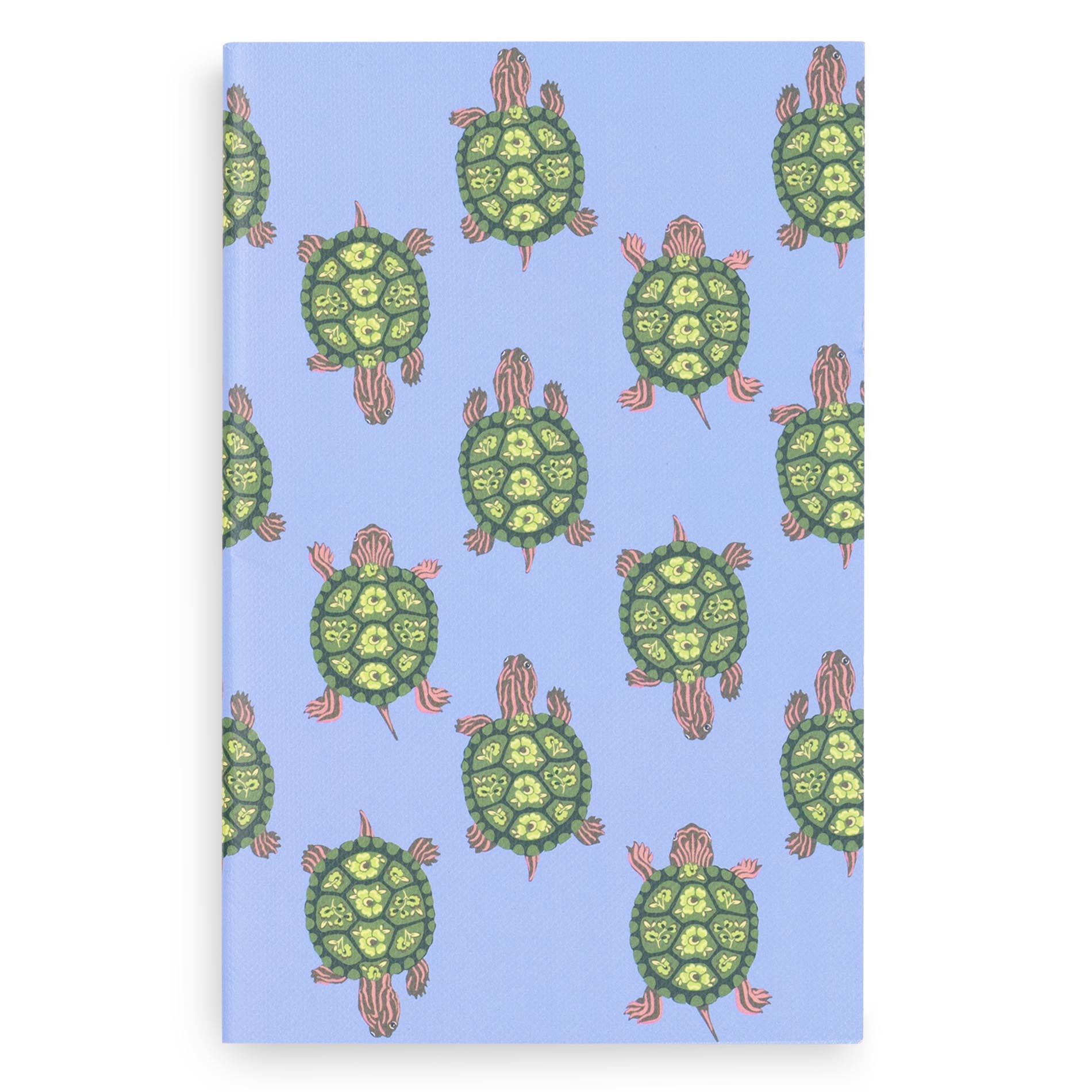 Notebook with green turtle pattern on a blue background