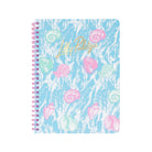 Notebook with shell pattern and 'Lilly Pulitzer' branding on a white background
