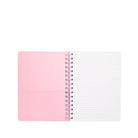 Notebook with pink cover and white pages on a white background