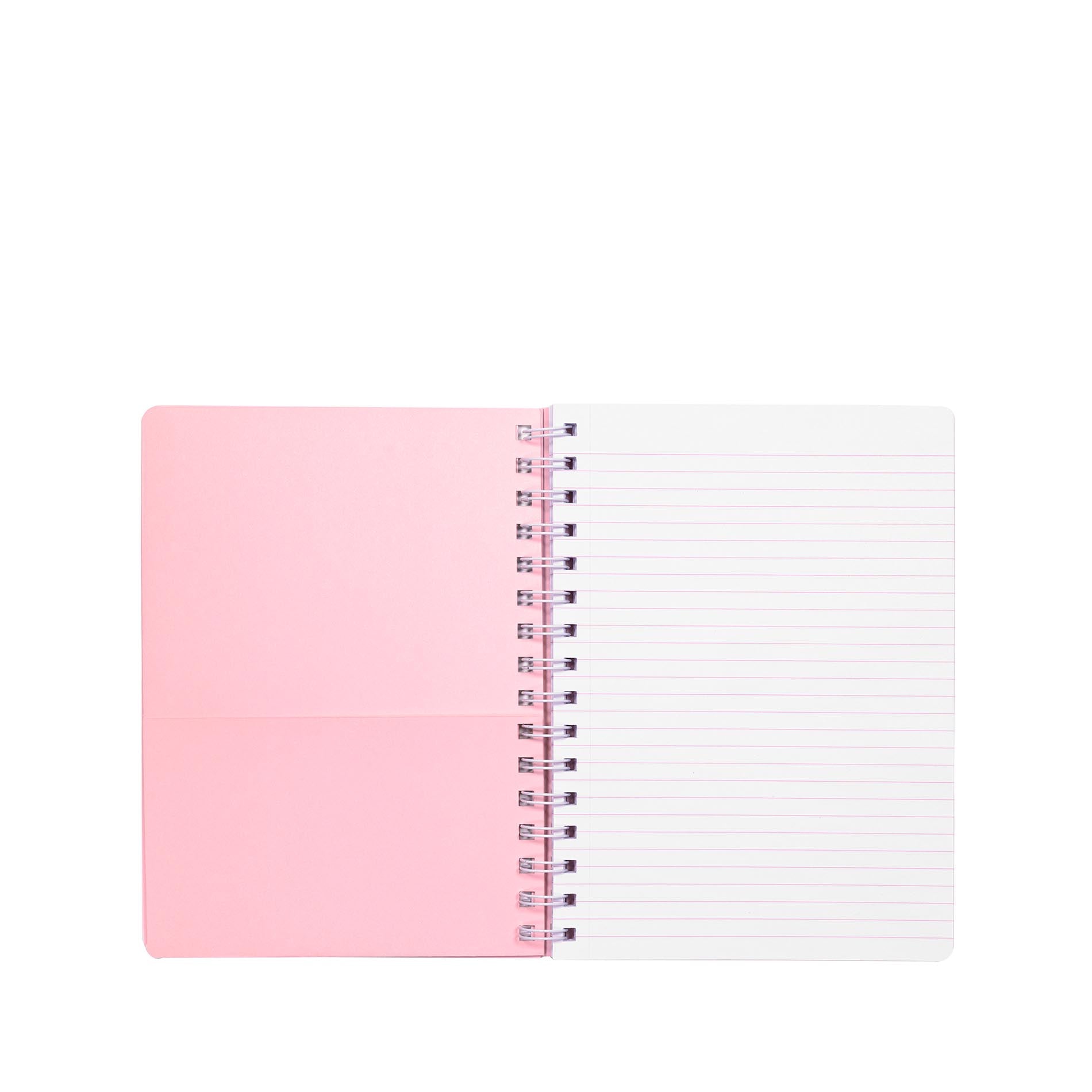 Notebook with pink cover and white pages on a white background