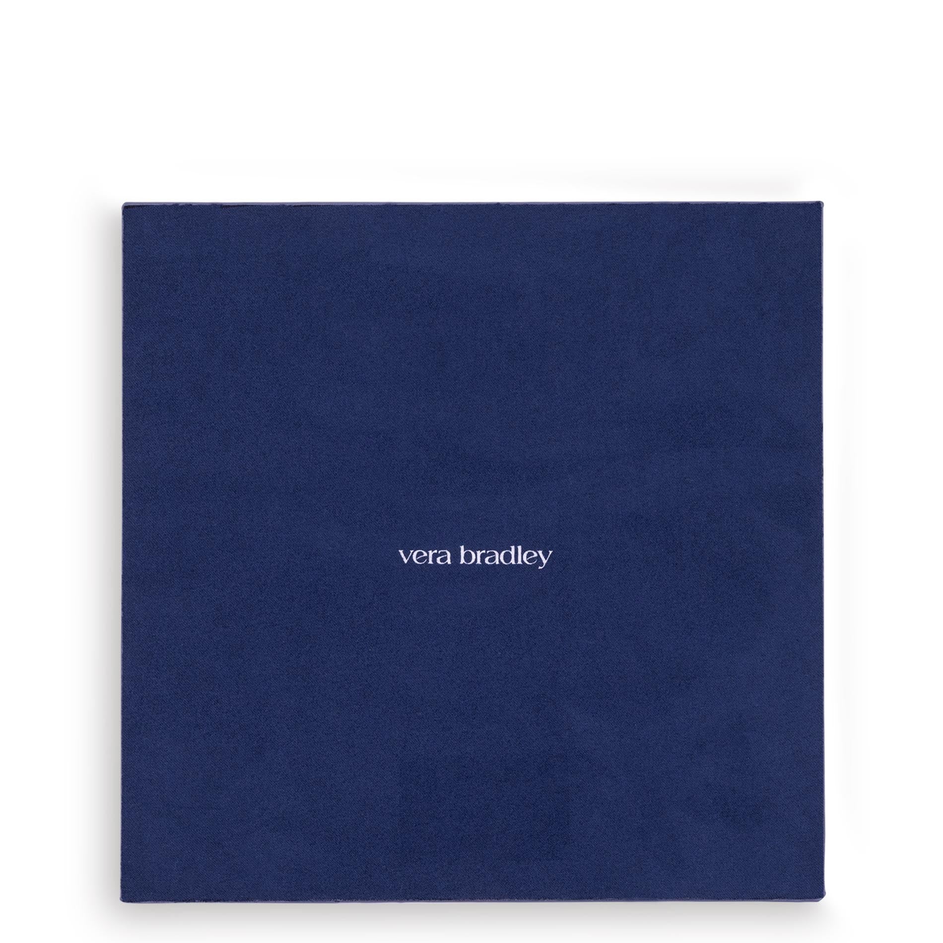 Blue and white patterned mouse pad on a white background with 'vera bradley' on the back