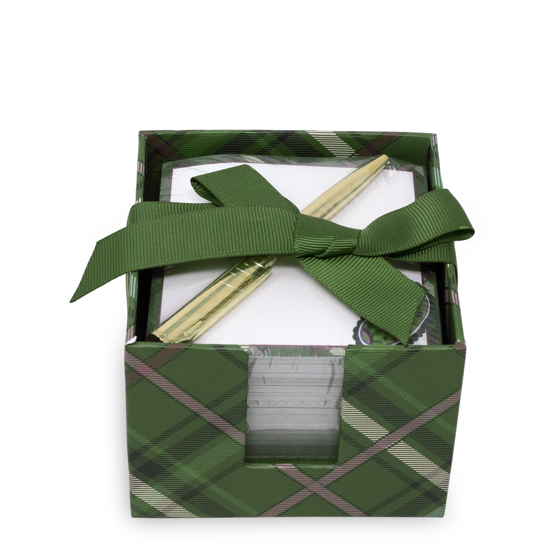top view of square green plaid notepad holder box with a gold pen inserted into the top, holding white notepads. The box features a green tartan pattern with black and pinkish stripes, and a small decorative emblem is visible on the notepad.