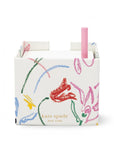 back view of white notecube with sketch floral print and pink pen