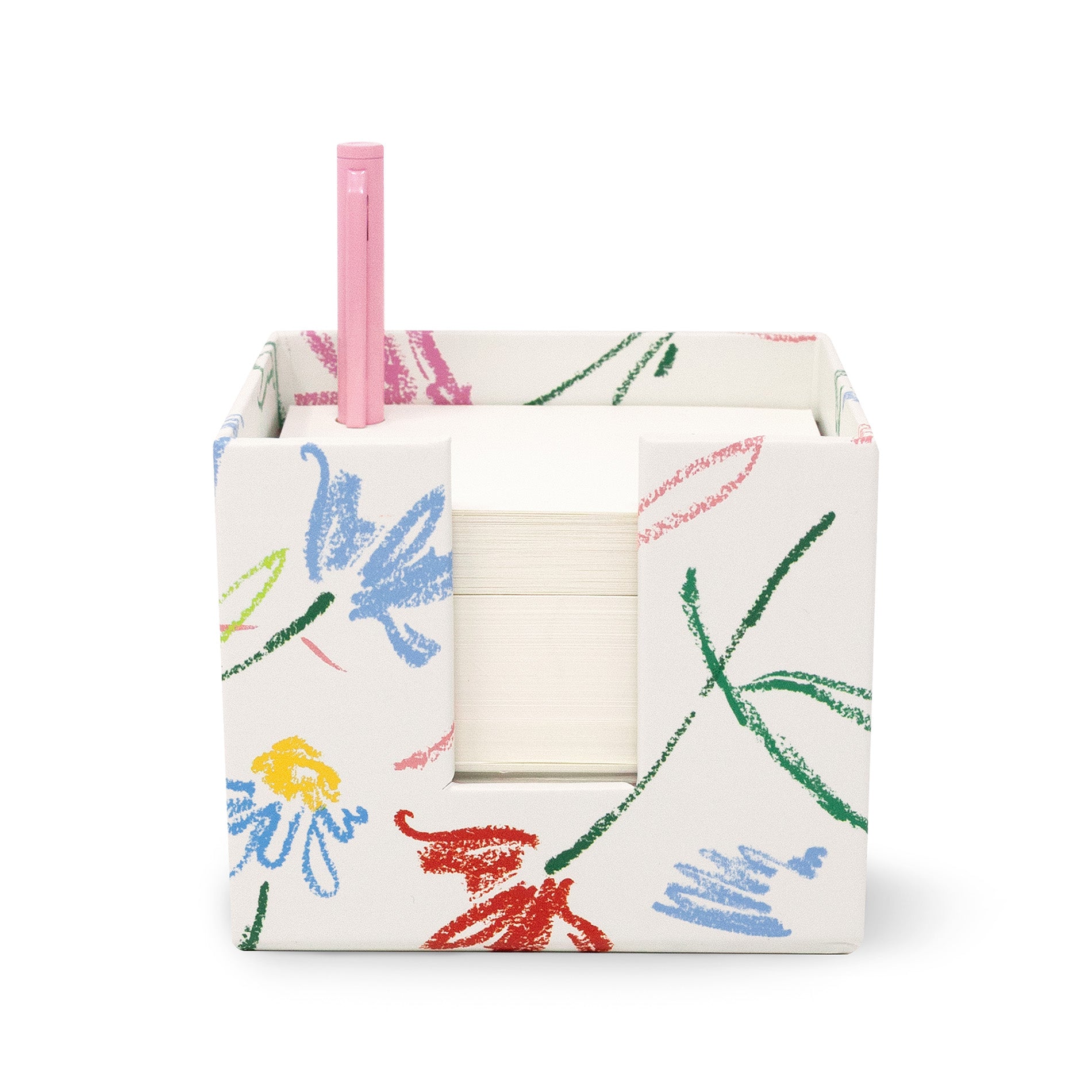 front view of white notecube with sketch floral print and pink pen