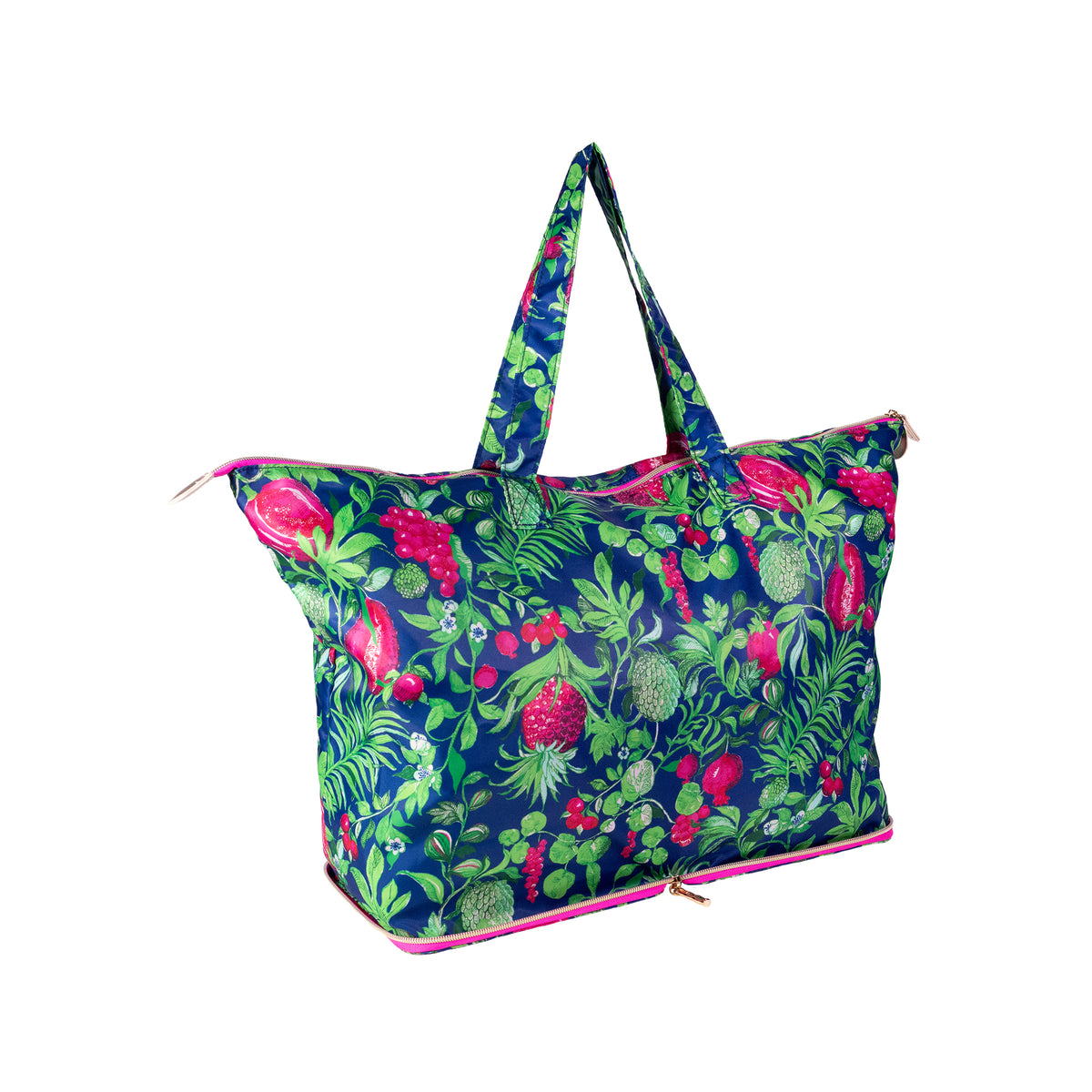 A large tote bag with a vibrant tropical fruit and leaf print on a navy blue background, featuring bright pink accents along the zipper and handle edges.