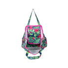 A tote bag with a vibrant tropical floral and botanical print, featuring a prominent front zippered pocket with a hot pink border and matching pink trim along the handles and opening.