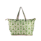 A green and white patterned tote bag with pink trim and handles, shown against a plain white background.