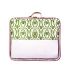 A rectangular zippered travel pouch with a top handle, featuring a green and white palm tree pattern on the upper half and a clear plastic lower half, finished with pink trim.