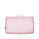 pink mesh back of pink and white striped packing cube on a white background