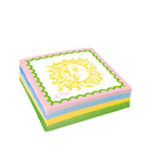 Stack of colorful napkins with a sun design on a white background