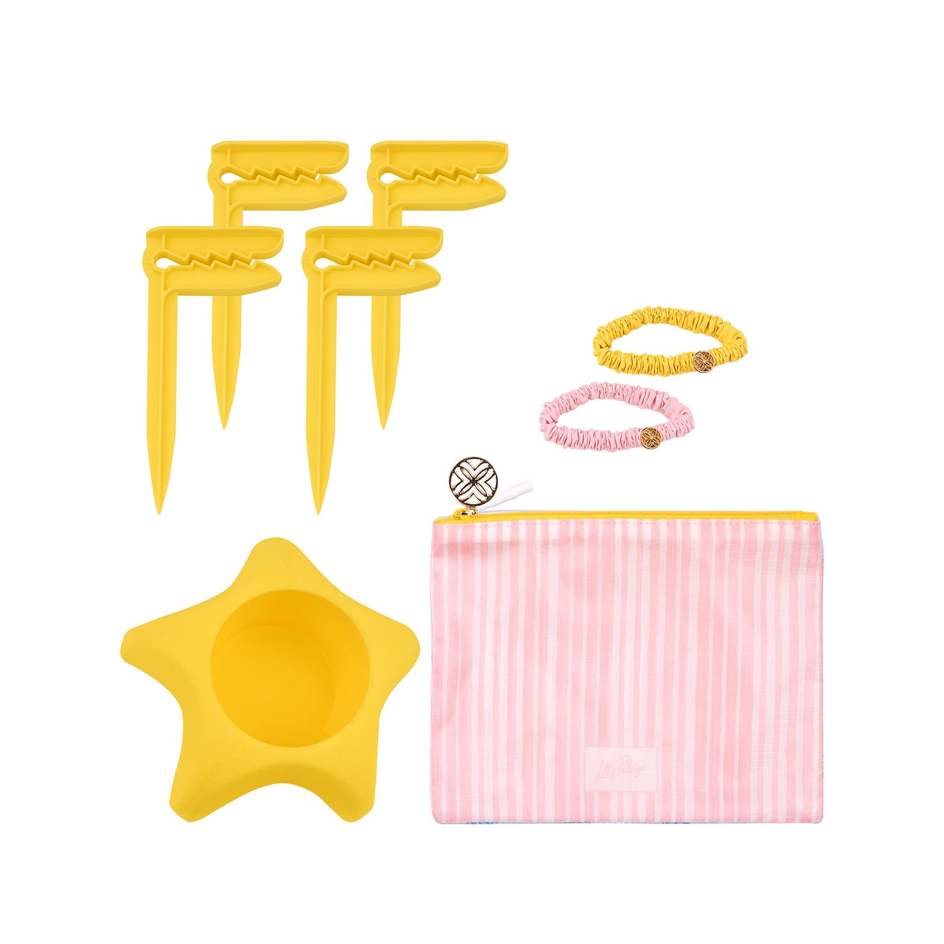 Set of yellow and pink pet accessories including a star-shaped bowl, pink pouch, and hair ties on a white background.