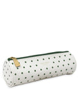 White cylindrical pouch with green polka dots and a gold zipper on a white background