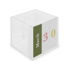 White cube-shaped calendar with 'March 30' on a white background